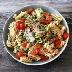 Crunchy veggies, canned tuna and pasta combine in this easy Tuna Pasta Salad recipe. It's perfect for summer barbecues, or pot luck dinners all year round.