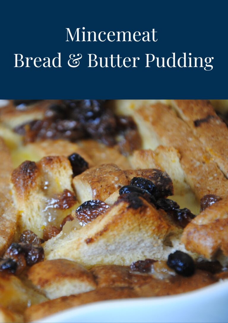 A photo of the corner of a casserole dish containing Mincemeat Bread and Butter Pudding