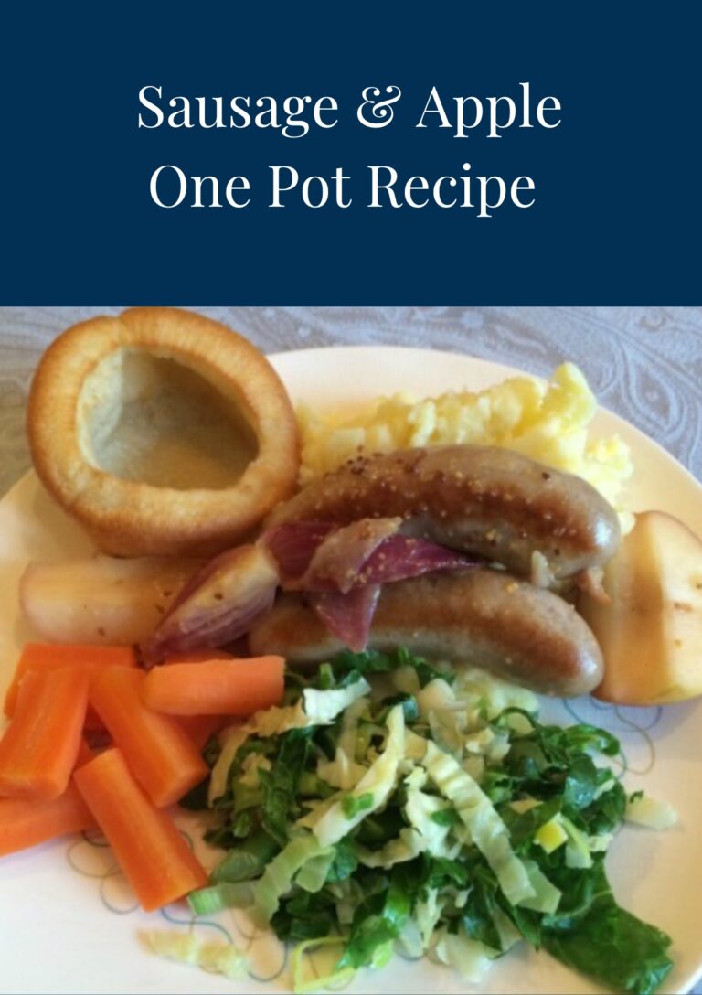 Sausage and Apple One Pot recipe served with a Yorkshire pudding, mashed potatoes, greens and carrots