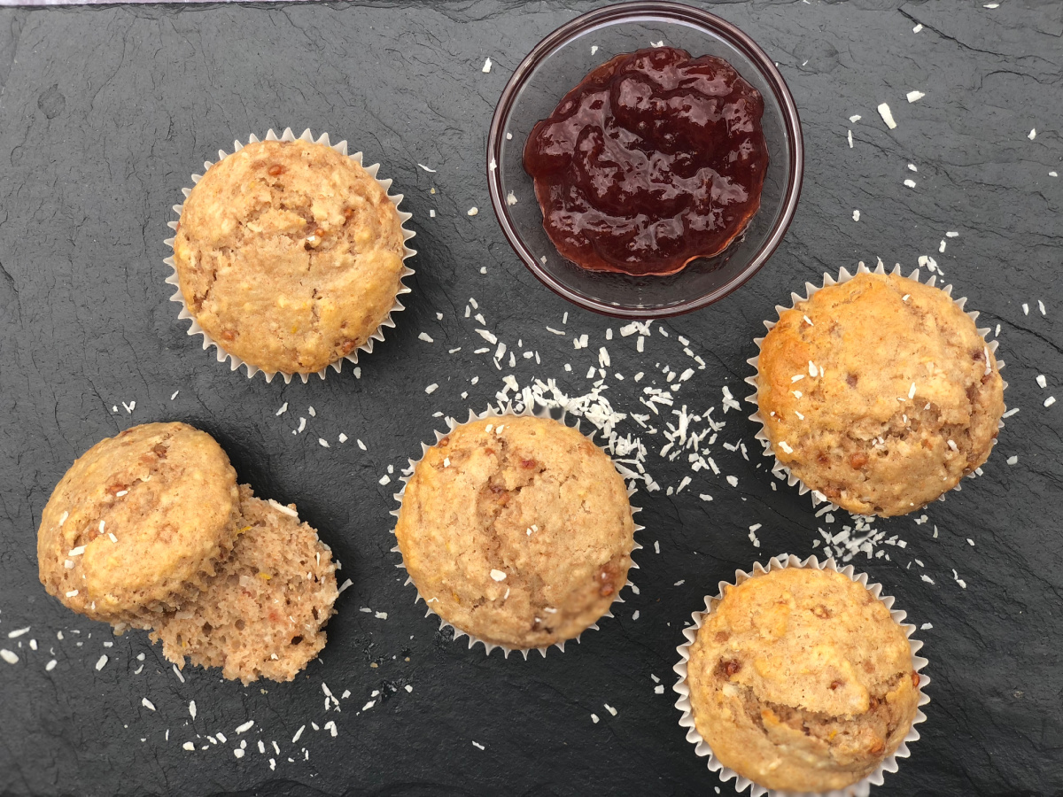 My Mom's Jam Muffins served on a slate with jam alongside