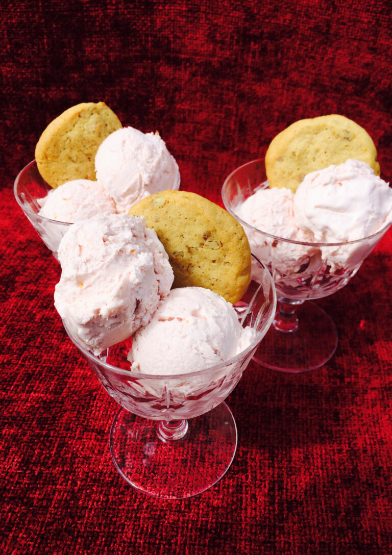 Blood Orange Ice Cream served in crystal glasses with Orange Pecan Cookies