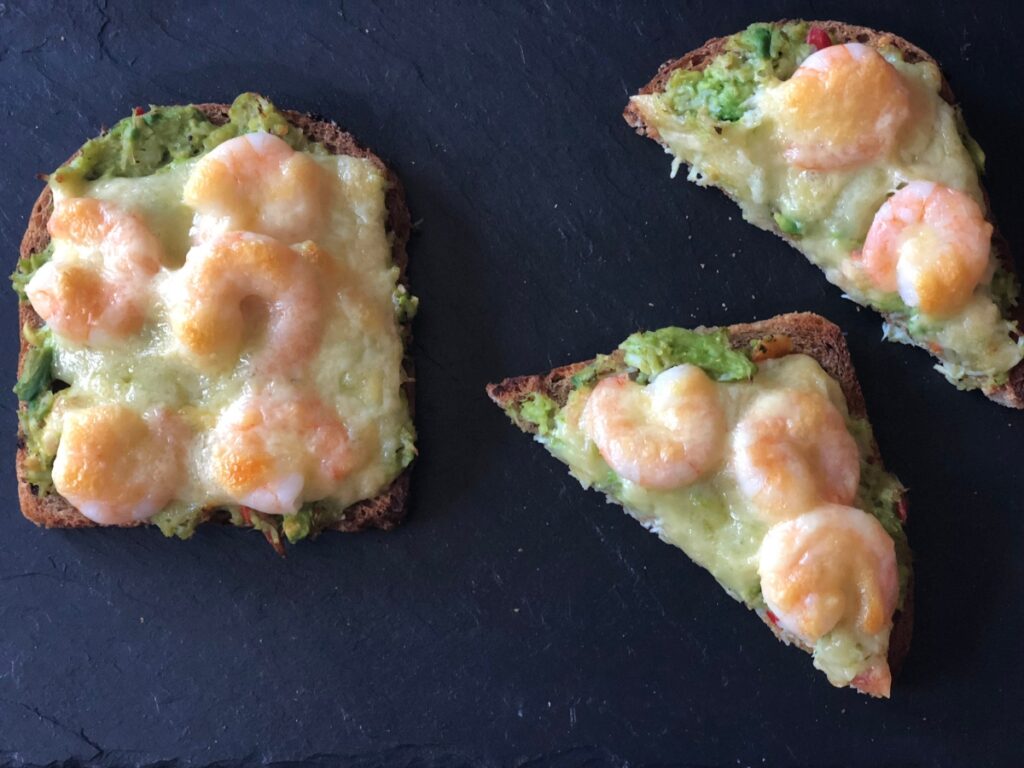 Shrimp and Crab Melts served on a slate serving board.