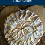 A whole Apple Butterscotch Cake served on a heart shaped wooden board
