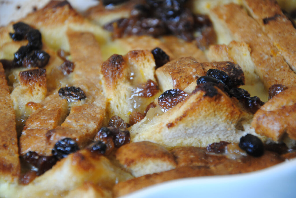 Bread and butter pudding made with mincemeat in a casserole dish