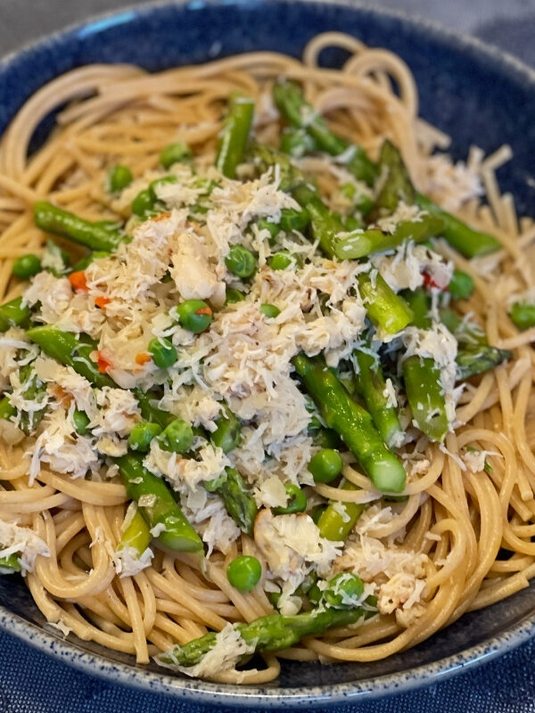 Fresh crab and spring vegetables make this fast, easy Crab Linguine recipe a delight.