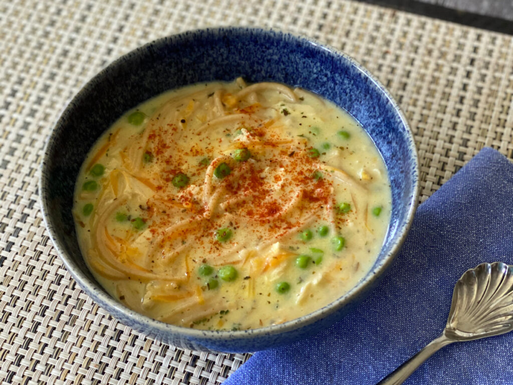 Easy Chicken Noodle Soup recipes served in a blue bowl.