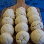 Lemon Crinkle Cookies served on a bread board
