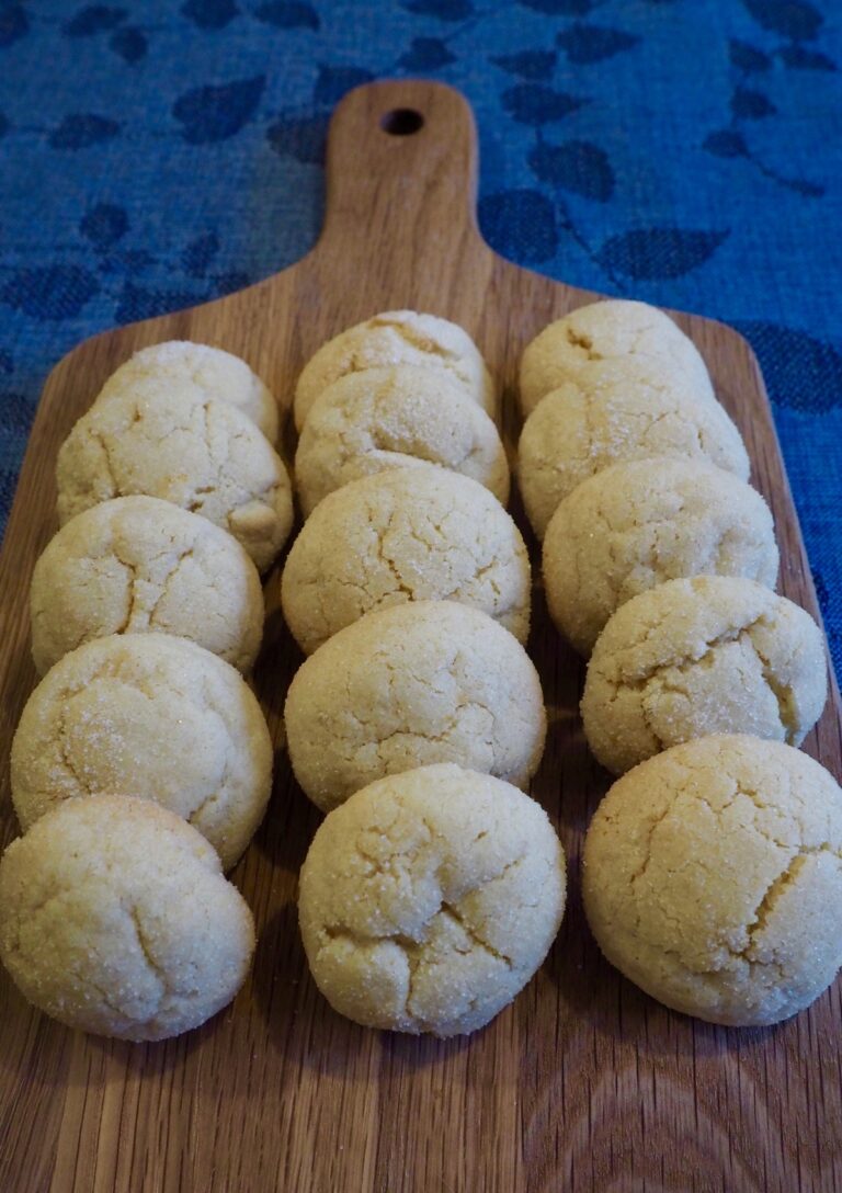 Lemon Crinkle Cookies served on a bread board
