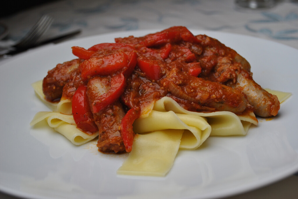 Spicy Sausage Pasta served on a white plate