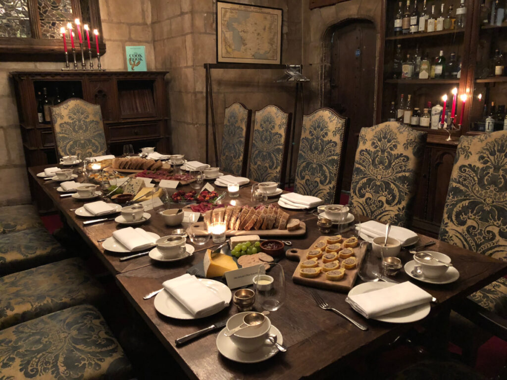 A table set with with tea and snacks in the Crypt at Fortnum & Mason at the end of the Delicious History Tour