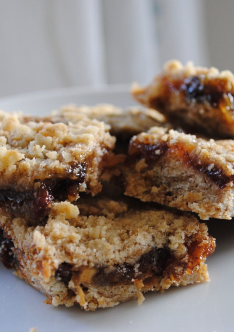 Old Fashioned Mincemeat Oat Squares cut, stacked and served on a white plate