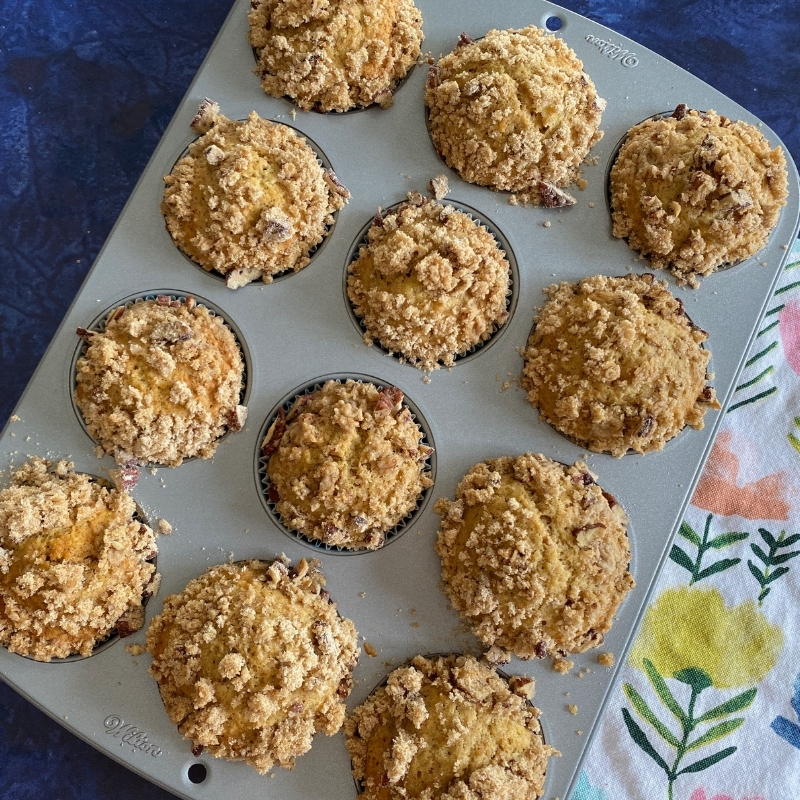Banana Streusel Muffins with Flaxseed in a muffin tin
