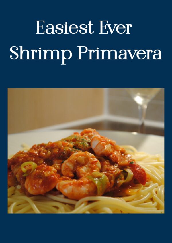 Shrimp Primavera served on a bed of spaghetti