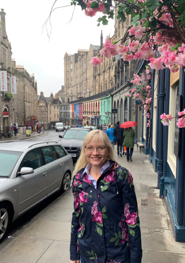 April J Harris standing on Victoria Street during a Weekend in Edinburgh