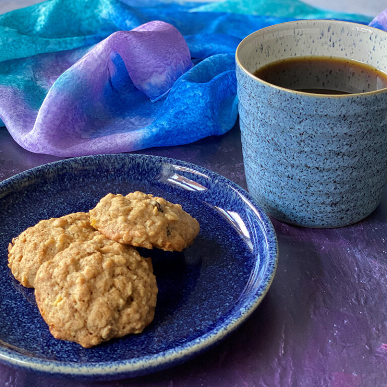 Banana Oatmeal Cookies served on a plate with a cup of tea