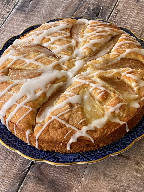 Pear and Ginger Cake served on a blue willow plate