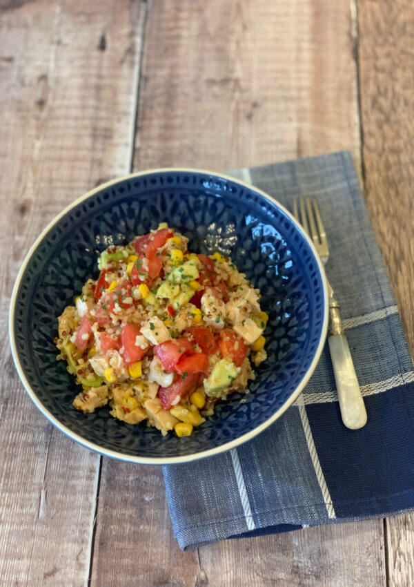 Chicken Salad with Salsa and Quinoa served in a blue bowl