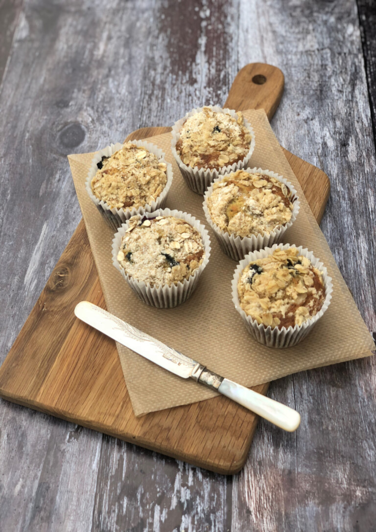 Blueberry Chia Muffins served on a bread board