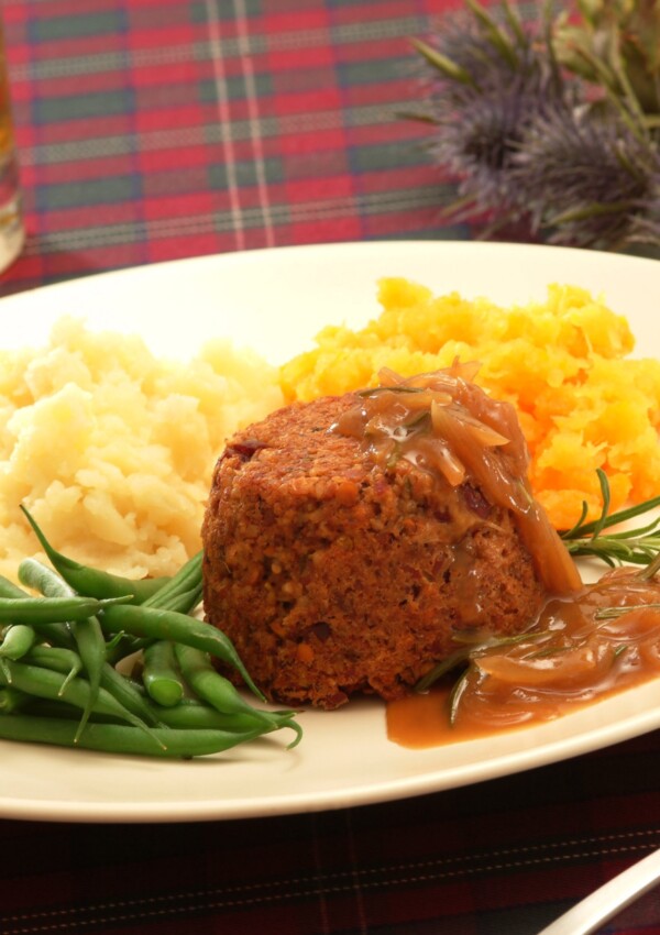 Vegetarian Haggis served with mashed potatoes, swede and green vegetables