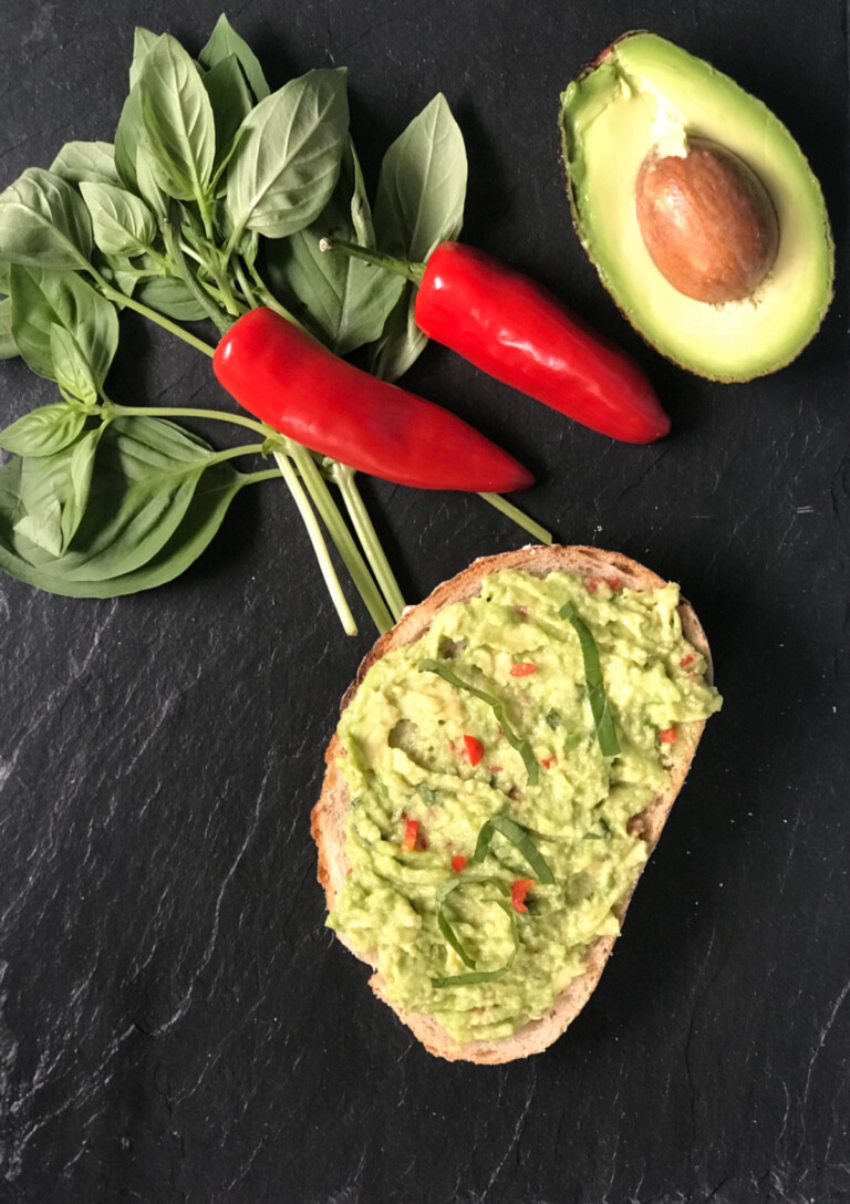 Avocado on toast served on a slate