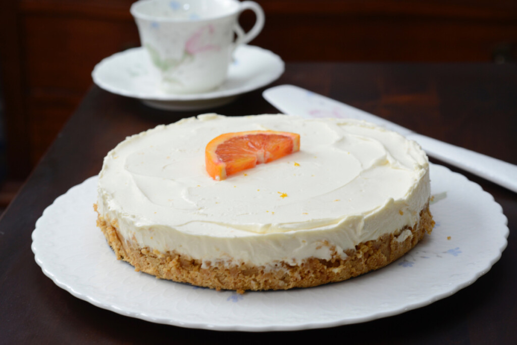 Easy No Bake Orange Cheesecake served on a platter