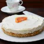 Easy No Bake Orange Cheesecake served on a platter