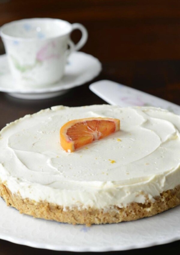Easy No Bake Orange Cheesecake served on a platter