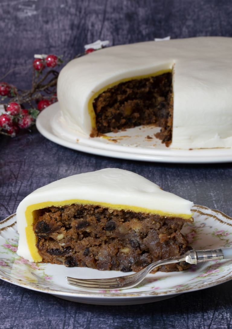 Gluten Free Christmas Cake with a slice served on a plate