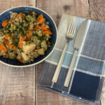Vegetable and Barley Stew served in a blue bowl