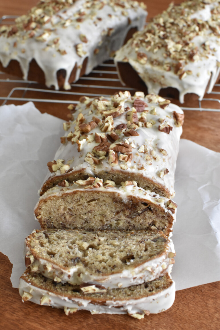 Three Spiced Banana Nut Loaves. The one in the foreground is sliced.