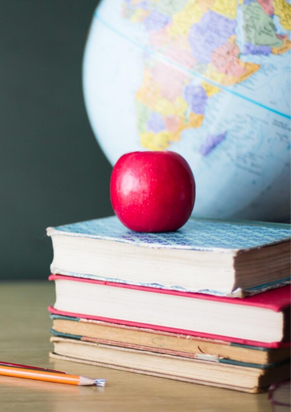 First day of school books and globe