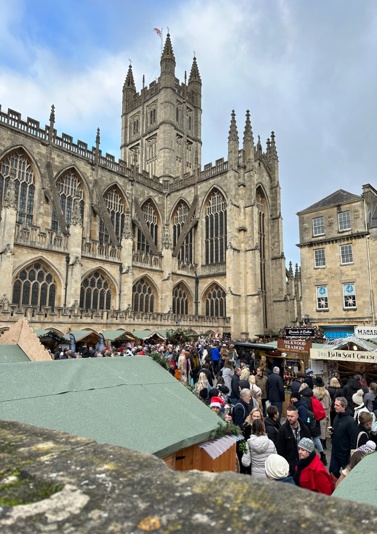 Bath Christmas Market with Bath Cathedral in the background 
