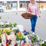 March 2023 Edition of Hearth and Soul -April J Harris in a flower market