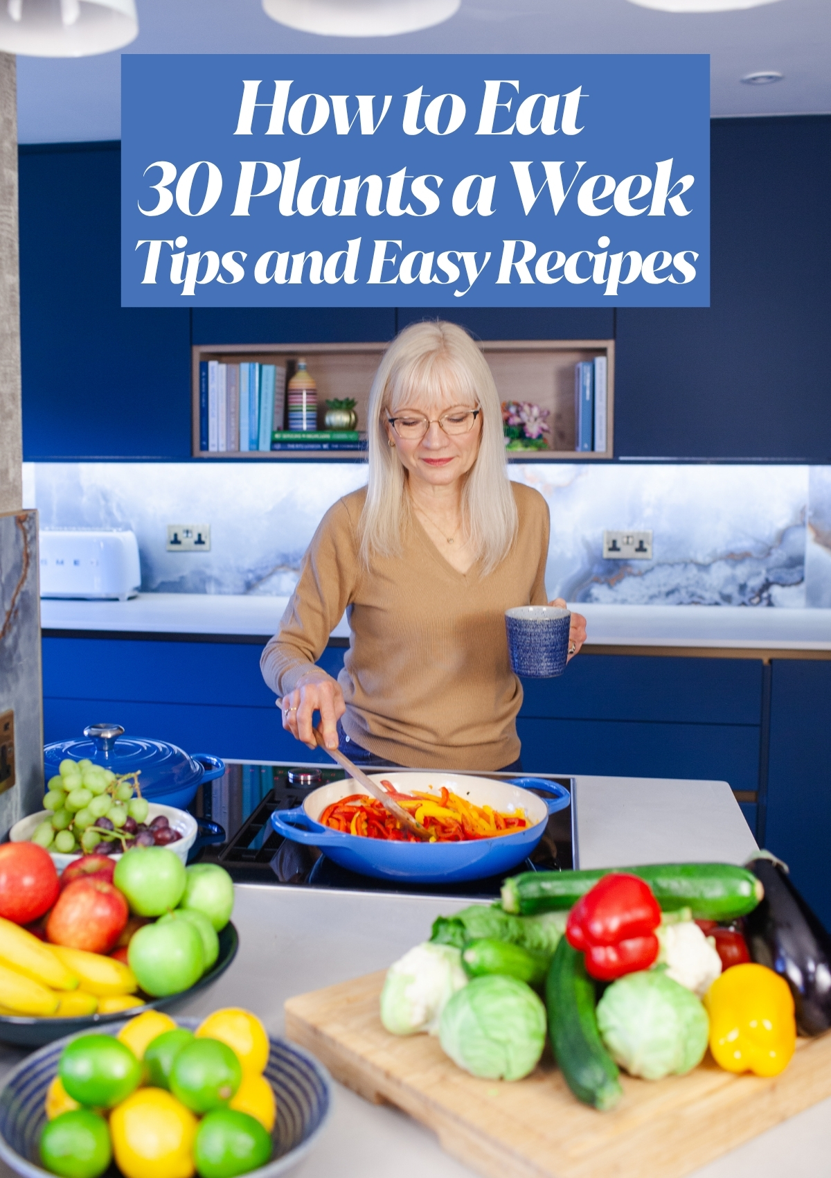 A photograph of April J Harris stirring sliced red peppers in a pan. There are fruit and vegetables arranged all around her on a kitchen island. The text How To Eat 30 Plants a Week appears on the photograph