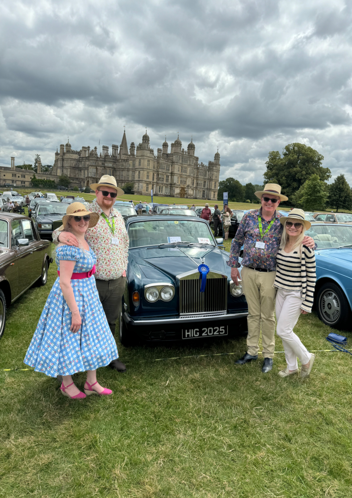 April and Guy Harris and family standing in front of their 1977 Rolls-Royce Silver Shadow II